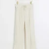 Cream side stripe wide leg joggers