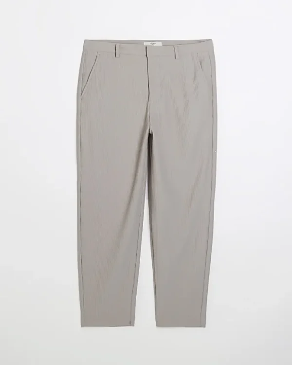 Ecru tapered fit plisse smart trousers