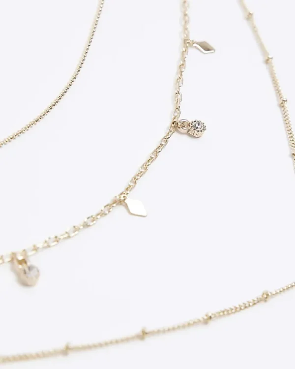 Gold charm multirow necklace