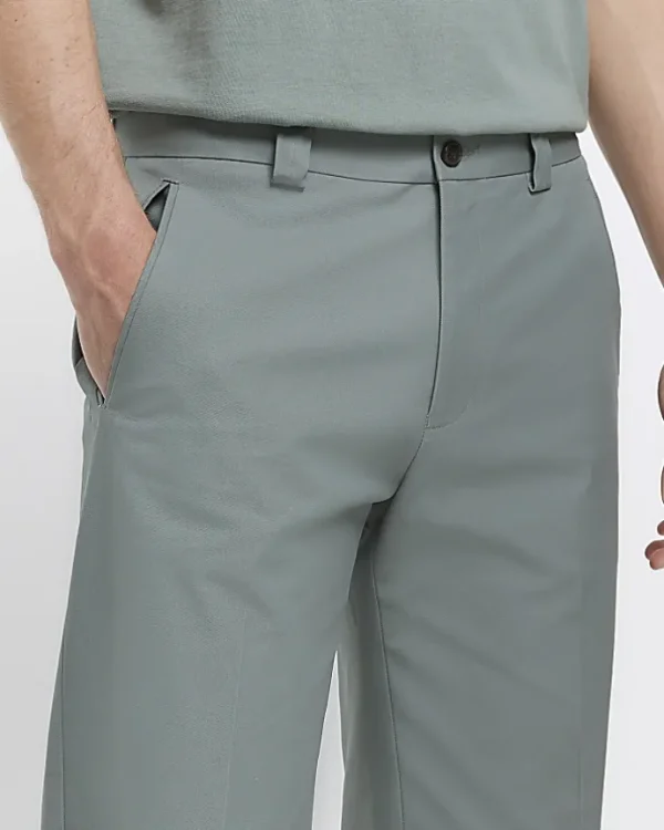 Green tapered fit smart trousers