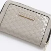 Grey patent embossed RI purse