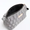 Grey quilted makeup bag