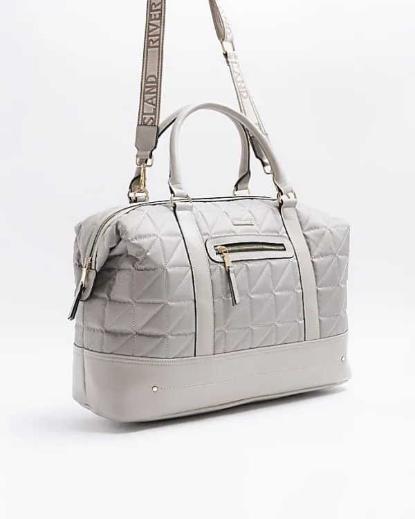 Grey quilted zip travel bag