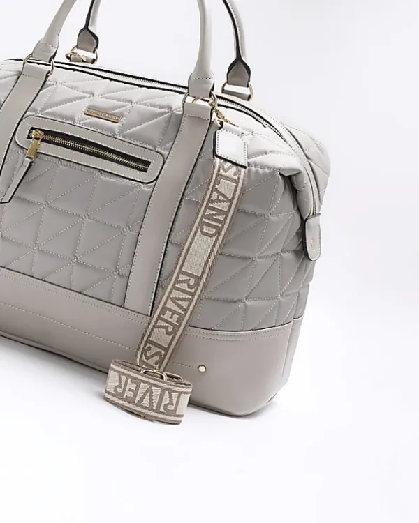 Grey quilted zip travel bag