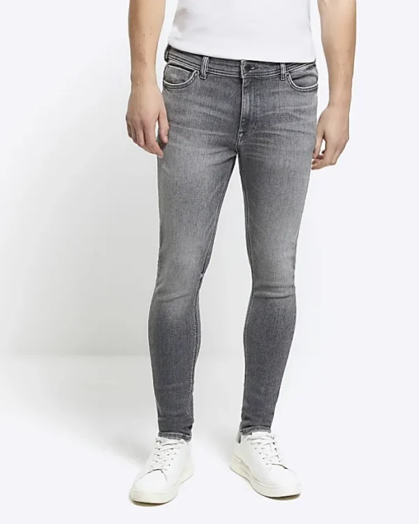 Grey super skinny spray on faded jeans