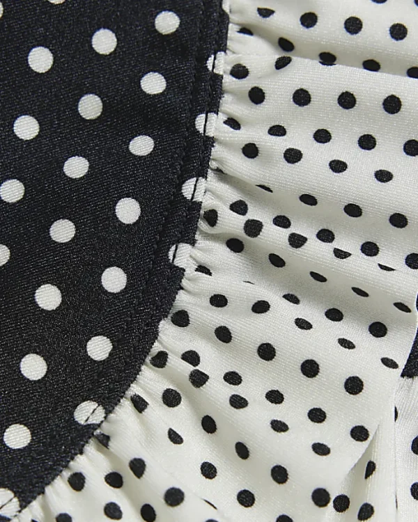 Mini girls black polka dot swim skirt