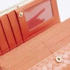 Orange embossed weave purse