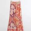 Orange floral wide leg trousers