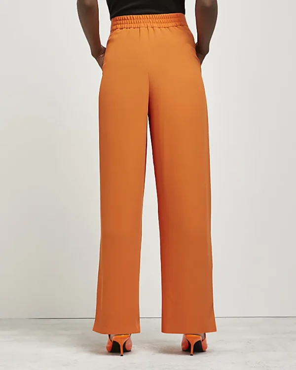 Orange wide leg trousers
