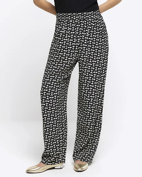 Petite black geometric wide leg trousers