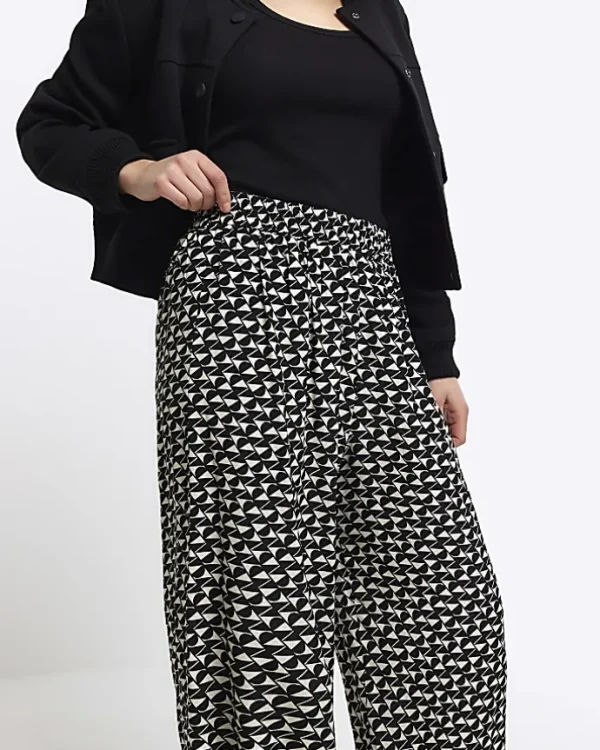 Petite black geometric wide leg trousers