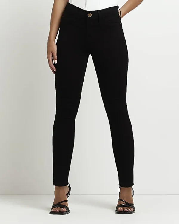 Petite black Molly mid rise skinny jeans