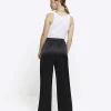 Petite black satin wide leg trousers