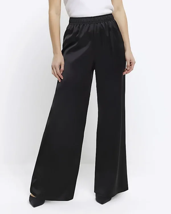 Petite black satin wide leg trousers