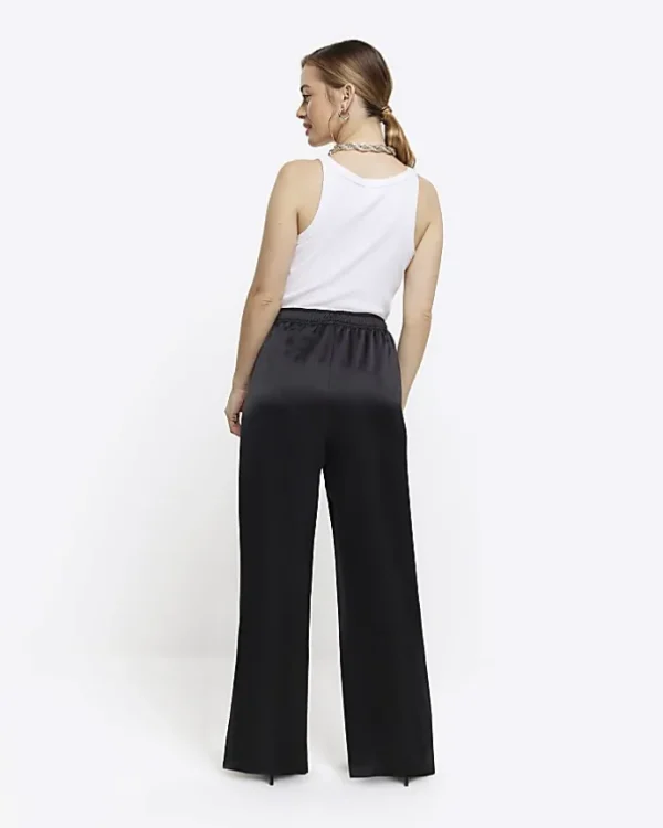 Petite black satin wide leg trousers