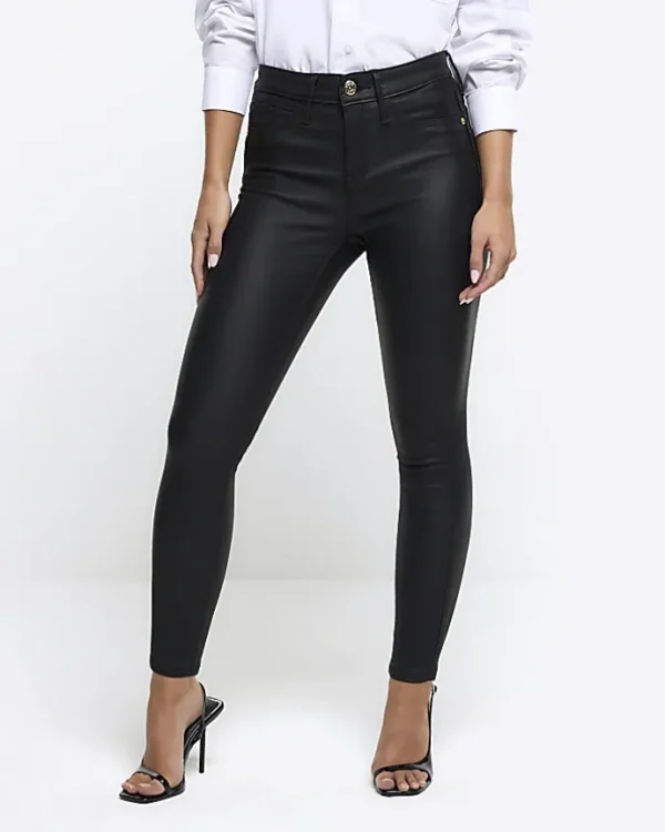 Petite black skinny fit coated jeans