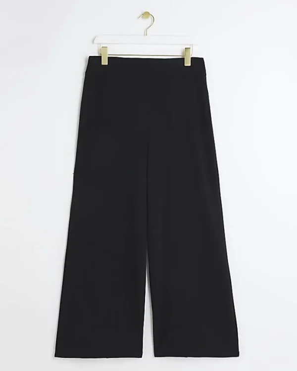 Petite black stitched wide leg trousers