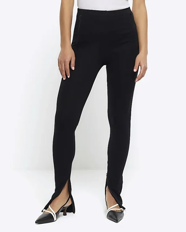 Petite black zip hem leggings