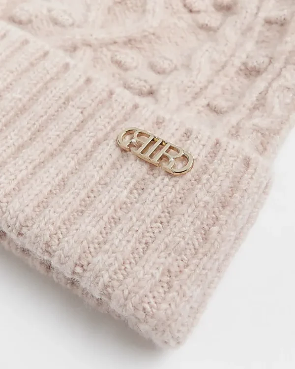 Pink cable knit beanie hat