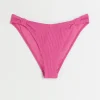 Pink low rise knot bikini bottoms