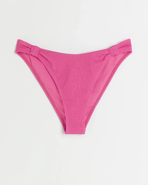 Pink low rise knot bikini bottoms