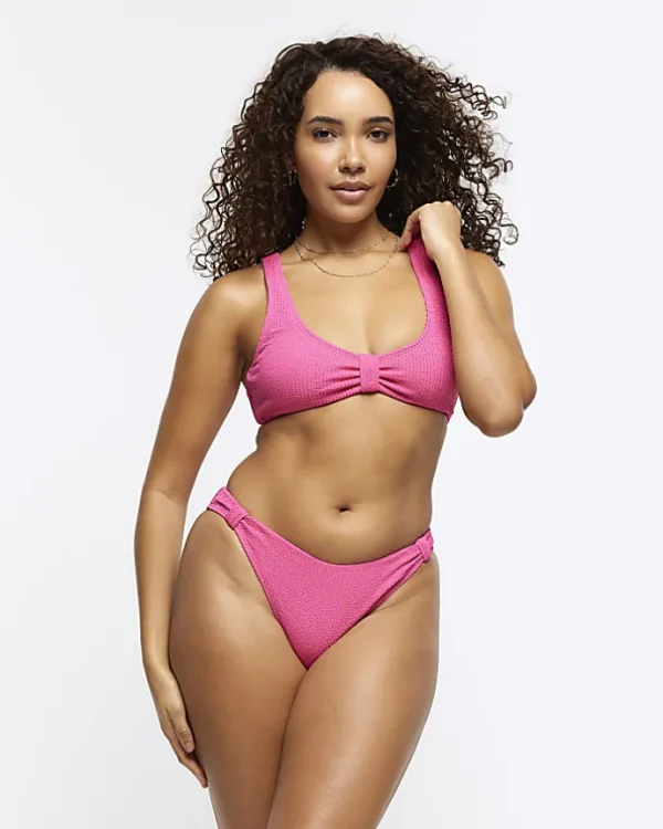 Pink low rise knot bikini bottoms