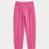 Pink pleated tapered trousers