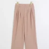 Pink pleated wide leg trousers