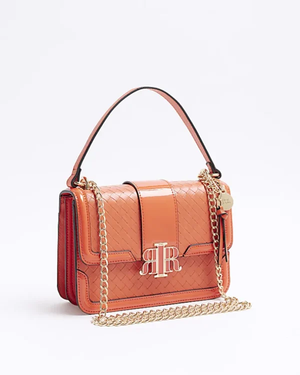 Red embossed woven satchel bag