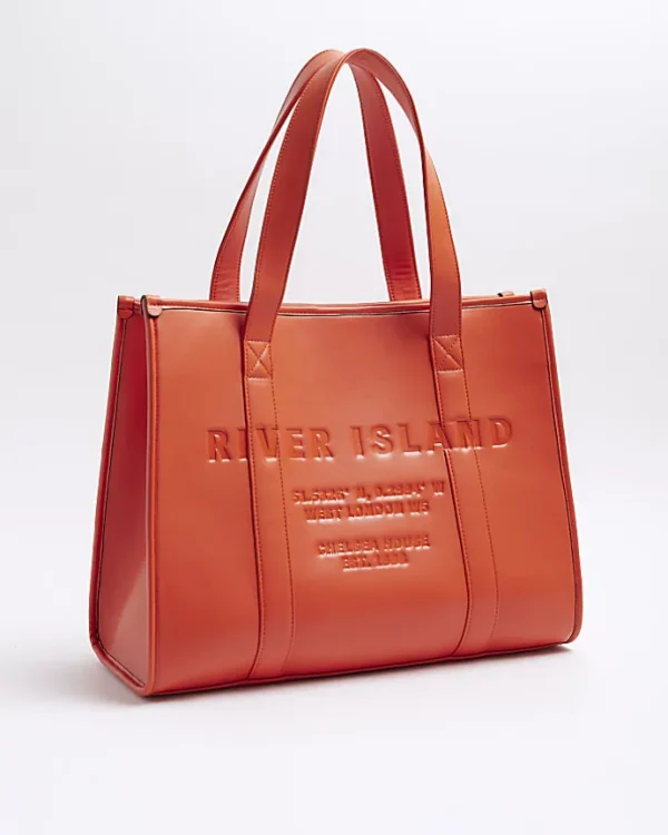 Red faux leather embossed shopper bag