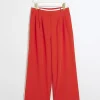 Red side stripe wide leg trousers