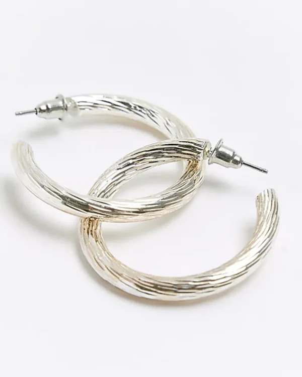 Silver textured hoop earrings